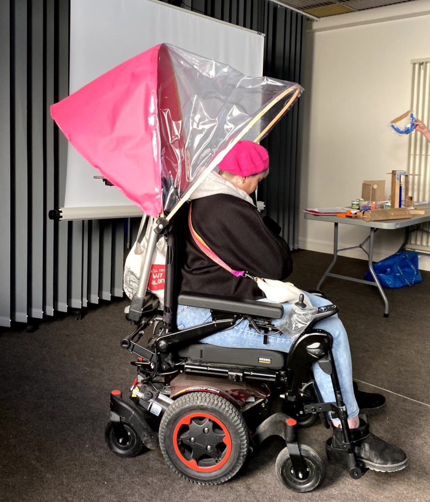 Le parapluie de fauteuil roulant